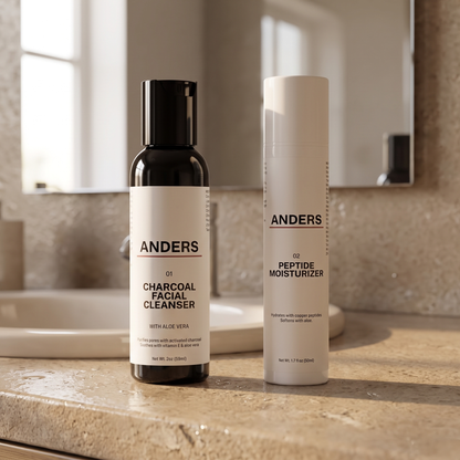 The ANDERS Set: Charcoal Facial Cleanser and Peptide Moisturizer side by side on a bathroom counter